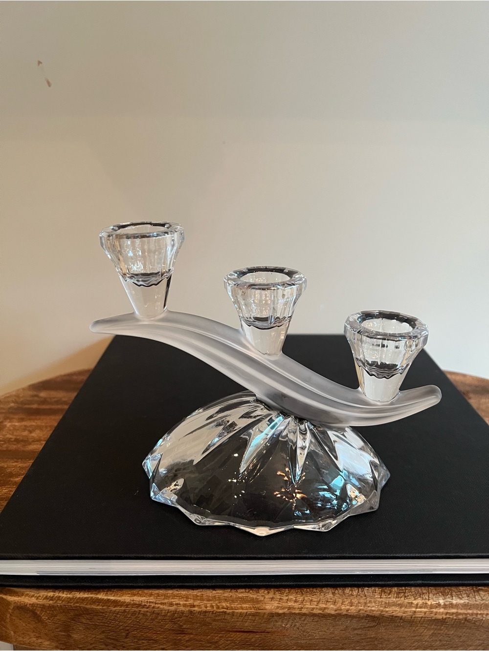 Glass candle holder Features a unique asymmetrical "wave" or "wing" arm